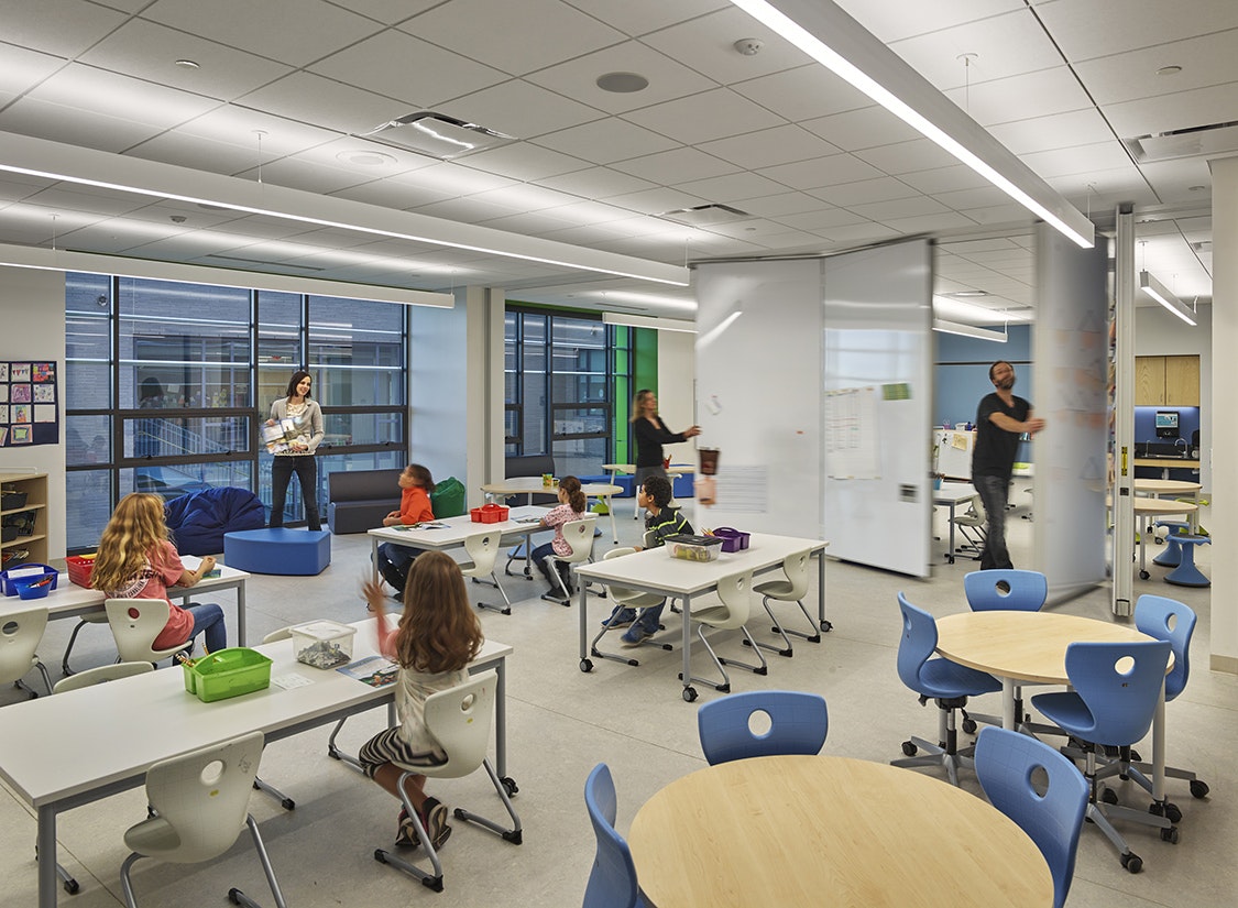 The elementary school features 3 floors, including 42 classrooms subdivided into innovative “learning neighborhoods” which will encourage collaboration and novel curricular arrangements that support teaching and learning, while allowing for flexibility in how the building is used.
